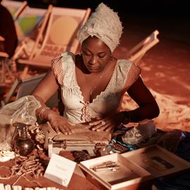 Foto von Alicia der Zigarrenrollerin bei einer Vorstellung